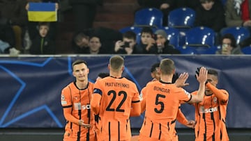 Shakhtar Donetsk's players celebrate their team scoring the 2-0 goal during the UEFA Champions League football match between FC Shakhtar Donetsk and Stade Brestois 29 (Brest) in Gelsenkirchen, western Germany on January 22, 2025. (Photo by INA FASSBENDER / AFP)