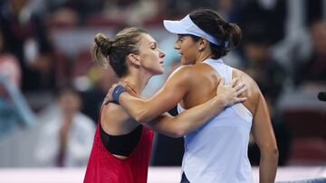 BEIJING, CHINA - OCTOBER 08: Caroline Garcia of France is congratulated by Simona Halep of Romania after winning the Women's Singles finals match against on day nine of the 2017 China Open at the China National Tennis Centre on October 8, 2017 in Beijing, China. (Photo by Lintao Zhang/Getty Images)