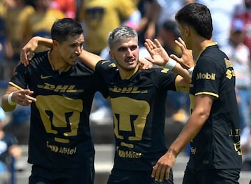 Gustavo Del Prete celebrates with teammates after scoring against Puebla during their Mexican Clausura football tournament match at the Universitario stadium in Mexico City on March 5, 2023.