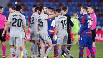 VALENCIA, SPAIN - FEBRUARY 26: Inigo Lekue of Athletic Club and Carlos Clerc of Levante UD shake hands after the La Liga Santander match between Levante UD and Athletic Club at Ciutat de Valencia Stadium on February 26, 2021 in Valencia, Spain. Sporting