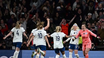 England's teammates celebrate after winning the "Finalissima" International football match between England and Brazil at Wembley Stadium in London on April 6, 2023. - England's wins against Brazil. (Photo by Ben Stansall / AFP)