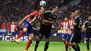 MADRID, SPAIN - OCTOBER 31:  Diego Godin of Atletico Madrid and Elvin Yunuszada of Qarabag FK clash during the UEFA Champions League group C match between Atletico Madrid and Qarabag FK at Estadio Wanda Metropolitano on October 31, 2017 in Madrid, Spain.  (Photo by Denis Doyle/Getty Images)