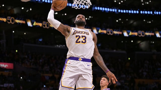 Dec 28, 2025; Los Angeles, California, USA; Los Angeles Lakers forward Lebron James (23) dunks in the second half against the Sacramento Kings at Crypto.com Arena. Mandatory Credit: Jayne Kamin-Oncea-Imagn Images