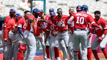 SAN JUAN, PUERTO RICO - MARCH 06: Yo�n Moncada #10 of the Team Cuba celebrates with teammates after hitting a two-run home run against the Team Panama during the third inning at Hiram Bithorn Stadium on March 06, 2026 in San Juan, Puerto Rico. Al Bello/Getty Images/AFP (Photo by AL BELLO / GETTY IMAGES NORTH AMERICA / Getty Images via AFP)