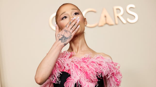 Ariana Grande stuns in perfectly pink peplum dress at the 97th Academy Awards