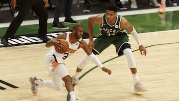 Jul 11, 2021; Milwaukee, Wisconsin, USA; Phoenix Suns guard Chris Paul (3) drives for the basket against Milwaukee Bucks forward Giannis Antetokounmpo (34) during the second quarter in game three of the 2021 NBA Finals at Fiserv Forum. Mandatory Credit: Jeff Hanisch-USA TODAY Sports