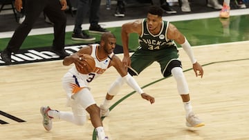 Jul 11, 2021; Milwaukee, Wisconsin, USA; Phoenix Suns guard Chris Paul (3) drives for the basket against Milwaukee Bucks forward Giannis Antetokounmpo (34) during the second quarter in game three of the 2021 NBA Finals at Fiserv Forum. Mandatory Credit: Jeff Hanisch-USA TODAY Sports