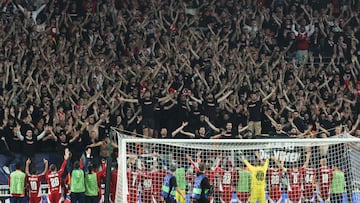 Brest's team celebrates with their supporters after winning the UEFA Champions League 1st round day 1 football match between Stade Brestois 29 (Brest) and Sturm Graz, at the Roudourou Stadium in Guingamp, western France, on September 19, 2024. (Photo by FRED TANNEAU / AFP)