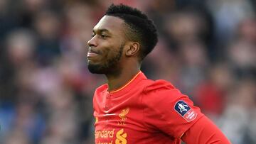 Liverpool's English striker Daniel Sturridge reacts after missing a chance during the English FA Cup third round football match between Liverpool and Plymouth Argyle at Anfield in Liverpool, north west England on January 8, 2017. / AFP PHOTO / Paul ELLIS / RESTRICTED TO EDITORIAL USE. No use with unauthorized audio, video, data, fixture lists, club/league logos or 'live' services. Online in-match use limited to 75 images, no video emulation. No use in betting, games or single club/league/player publications. /