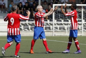 Assunçao y Rubio celebran un tanto del Atlético. 