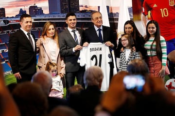 Soccer Football - Real Madrid - Brahim Diaz Presentation - Santiago Bernabeu, Madrid, Spain - January 7, 2019 Real Madrid's Brahim Diaz poses with his shirt alongside Real Madrid president Florentino Perez and family during the presentation REUTERS/Juan M