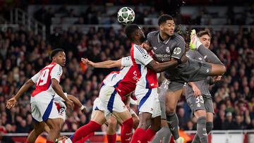 LONDON, ENGLAND - APRIL 08: Jude Bellingham of Real Madrid back flicks a shot at goal whilst under pressure from Thomas Partey of Arsenal during the UEFA Champions League 2024/25 Quarter Final First Leg match between Arsenal FC and Real Madrid C.F. at Emirates Stadium on April 08, 2025 in London, England. (Photo by Julian Finney - UEFA/UEFA via Getty Images)