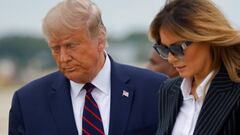 U.S. President Donald Trump walks with first lady Melania Trump at Cleveland Hopkins International Airport in Cleveland, Ohio, U.S., September 29, 2020. Picture taken September 29, 2020. REUTERS/Carlos Barria