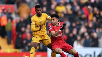 Soccer Football - Premier League - Liverpool v Wolverhampton Wanderers - Anfield, Liverpool, Britain - February 16, 2025 Wolverhampton Wanderers' Nelson Semedo in action with Liverpool's Luis Diaz REUTERS/Phil Noble EDITORIAL USE ONLY. NO USE WITH UNAUTHORIZED AUDIO, VIDEO, DATA, FIXTURE LISTS, CLUB/LEAGUE LOGOS OR 'LIVE' SERVICES. ONLINE IN-MATCH USE LIMITED TO 120 IMAGES, NO VIDEO EMULATION. NO USE IN BETTING, GAMES OR SINGLE CLUB/LEAGUE/PLAYER PUBLICATIONS. PLEASE CONTACT YOUR ACCOUNT REPRESENTATIVE FOR FURTHER DETAILS..