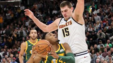 Jan 23, 2019; Salt Lake City, UT, USA; Utah Jazz guard Donovan Mitchell (45) drives against Denver Nuggets center Nikola Jokic (15) during the second half at Vivint Smart Home Arena. Utah won 114-108. Mandatory Credit: Chris Nicoll-USA TODAY Sports