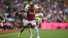 BIRMINGHAM, ENGLAND - SEPTEMBER 03: Leon Bailey of Aston Villa is challenged by Joao Cancelo of Manchester City during the Premier League match between Aston Villa and Manchester City at Villa Park on September 03, 2022 in Birmingham, England. (Photo by Shaun Botterill/Getty Images)