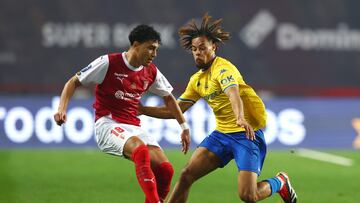 Soccer Football - Taca da Liga - Final - S.C. Braga v Estoril - Estadio Dr. Magalhaes Pessoa, Leiria, Portugal - January 27, 2024 Estoril's Koba Koindredi in action with S.C. Braga's Vitor Carvalho REUTERS/Pedro Nunes