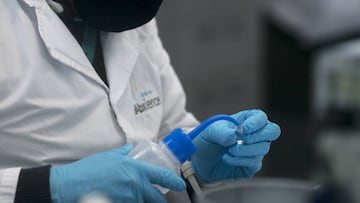 GARIN, ARGENTINA - AUGUST 13: A laboratory worker handles essay tubes at the production plant of mAbxience biotechnology company on August 13, 2020 in Garín, Argentina. The Argentina lab, property of Grupo Insud, will co-manufacture with Mexico the