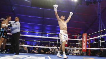 LAS VEGAS, NEVADA - AUGUST 13: Teofimo Lopez Jr. celebrates after referee Tony Weeks stops his junior welterweight fight against Pedro Campa at Resorts World Las Vegas on August 13, 2022 in Las Vegas, Nevada. Lopez won the fight with a seventh-round TKO.   Steve Marcus/Getty Images/AFP
== FOR NEWSPAPERS, INTERNET, TELCOS & TELEVISION USE ONLY ==