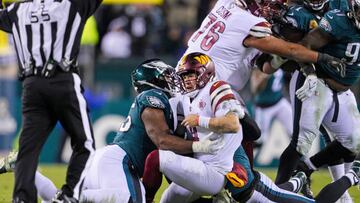 PHILADELPHIA, PA - NOVEMBER 14: Philadelphia Eagles defensive end Brandon Graham (55) hits Washington Commanders quarterback Taylor Heinicke (4) late causing a penalty during the game between the Washington Commanders and the Philadelphia Eagles on November 14, 2022 at Lincoln Financial Field  in Philadelphia, PA. (Photo by Andy Lewis/Icon Sportswire via Getty Images)