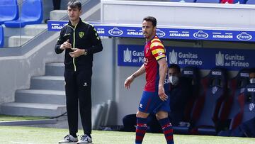 HUESCA, SPAIN - APRIL 25: José Rojo Martín 'Pacheta' of SD Huesca follows the game during the La Liga Santander match between SD Huesca and Getafe CF at Estadio El Alcoraz on April 25, 2021 in Huesca, Spain. Sporting stadiums aroun