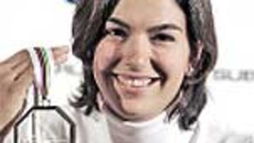 Rienda mostró su medalla.