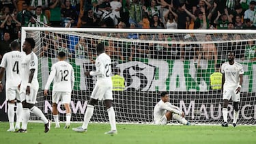Real Madrid players react at the end of the Spanish league football match between Real Betis and Real Madrid CF at the La Cartuja stadium in Seville on April 24 , 2026. (Photo by CRISTINA QUICLER / AFP)