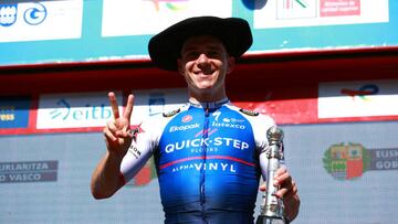 SAN SEBASTIAN, SPAIN - JULY 30: Remco Evenepoel of Belgium and Team Quick-Step - Alpha Vinyl celebrates winning the Txapela hat trophy on the podium ceremony after the 42nd Donostia San Sebastian Klasikoa 2022 - Men's Elite a 224,8km race from San Sebastian to San Sebastian / #Klasikoa2022 / on July 30, 2022 in San Sebastian, Spain. (Photo by Gonzalo Arroyo Moreno/Getty Images)