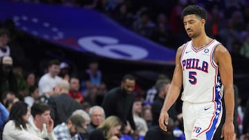 PHILADELPHIA, PENNSYLVANIA - MARCH 29: Quentin Grimes #5 of the Philadelphia 76ers walks towards the bench against the Miami Heat in the first half at the Wells Fargo Center on March 29, 2025 in Philadelphia, Pennsylvania. NOTE TO USER: User expressly acknowledges and agrees that, by downloading and/or using this photograph, user is consenting to the terms and conditions of the Getty Images License Agreement. Mitchell Leff/Getty Images/AFP (Photo by Mitchell Leff / GETTY IMAGES NORTH AMERICA / Getty Images via AFP)
