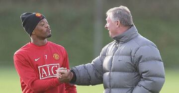 Evra (centre) spent all but one of his eight and a half years at United playing under Ferguson.