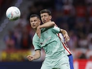 Athletic Bilbao's Spanish forward #11 Gorka Guruzeta fights for the ball with Atletico Madrid's French defender #15 Clement Lenglet during the Spanish league football match between Club Atletico de Madrid and Athletic Club Bilbao at the Metropolitano stadium in Madrid on April 25, 2026. (Photo by Oscar DEL POZO / AFP)