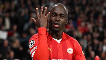 PSV Eindhoven's Dutch defender #03 Jordan Teze celebrates after scoring his team's second goal during the UEFA Champions League 1st round Group B football match between PSV Eindhoven and Sevilla FC at the Phillips Stadium in Eindhoven, on October 3, 2023. (Photo by JOHN THYS / AFP)