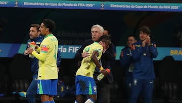 Soccer Football - World Cup - South American Qualifiers - Brazil v Paraguay - Neo Quimica Arena, Sao Paulo, Brazil - June 10, 2025 Brazil's Vinicius Junior celebrates scoring their first goal with coach Carlo Ancelotti REUTERS/Jean Carniel
