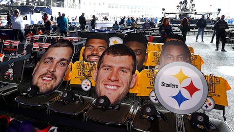 Apr 25, 2024; Detroit, MI, USA; Oversized pictures of Pittsburgh Steelers players sit in the seats of Steeler fans who will be inside the NFL draft theater in the background before the start of the 2024 NFL draft in Detroit on Thursday, April 25, 2024. Mandatory Credit: Eric Seals-USA TODAY Sports