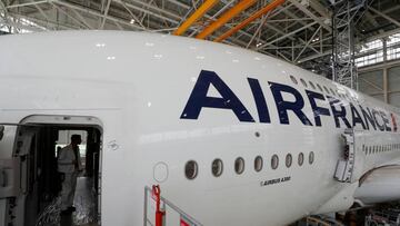 An employee works in an Airbus A380 plane inside the Air France KLM maintenance hangar at the Charles de Gaulle International Airport in Roissy, near Paris, France, May 31, 2016. REUTERS/Philippe Wojazer