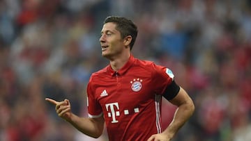 Bayern Munich&#039;s Polish striker Robert Lewandowski celebrate after his second goal during the German first division Bundesliga football match between FC Bayern Munich vs SV Werder Bremen in Munich