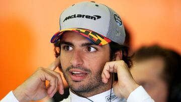 NORTHAMPTON, ENGLAND - JULY 12: Carlos Sainz of Spain and McLaren F1 prepares to drive in the garage during practice for the F1 Grand Prix of Great Britain at Silverstone on July 12, 2019 in Northampton, England. (Photo by Charles Coates/Getty Images)