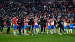 Girona's Spanish coach Michel (C,L) and team members celebrate victory at the end of the Spanish league football match between Girona FC and Club Atletico de Madrid  at the Montilivi stadium in Girona on January 3, 2024. Girona won 4-3. (Photo by Pau BARRENA / AFP)