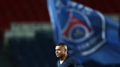 (FILES) Paris Saint-Germain's French forward Kylian Mbappe is seen at the end of the French L1 football match between Paris Saint-Germain (PSG) and Ajaccio at the Parc des Princes in Paris, on May 13, 2023. French champions Paris Saint-Germain have left Kylian Mbappe out of their squad for a pre-season tour of Japan, casting further doubt on the star striker's future. Mbappe declared in May 2023 that he would not extend his PSG contract, which expires next year, but indicated he wanted to remain at the club for a final season. (Photo by Anne-Christine POUJOULAT / AFP)