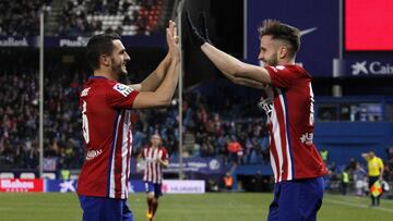 Koke y Sa&uacute;l celebran un gol. 