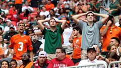 Sep 4, 2021; Atlanta, Georgia, USA; Miami Hurricanes fans react after Miami turned the ball over on downs during the third quarter against the Alabama Crimson Tide at Mercedes-Benz Stadium. Mandatory Credit: Jason Getz-USA TODAY Sports