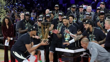 LAS VEGAS, NEVADA - DECEMBER 17: Giannis Antetokounmpo #34 of the Milwaukee Bucks lifts the championship trophy as he celebrates with teammates after the Bucks defeated the Oklahoma City Thunder 97-81 to win the championship game of the Emirates NBA Cup at T-Mobile Arena on December 17, 2024 in Las Vegas, Nevada. NOTE TO USER: User expressly acknowledges and agrees that, by downloading and or using this photograph, User is consenting to the terms and conditions of the Getty Images License Agreement. Ethan Miller/Getty Images/AFP (Photo by Ethan Miller / GETTY IMAGES NORTH AMERICA / Getty Images via AFP)