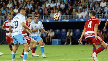 Roberto, Sangalli y Van Rijn en el Málaga-Recre Granada.