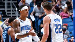 ORLANDO, FL - OCTOBER 11: Paolo Banchero #5 high fives Franz Wagner #22 of the Orlando Magic during the game against the Memphis Grizzlies on October 11, 2022 at Amway Center in Orlando, Florida. NOTE TO USER: User expressly acknowledges and agrees that, by downloading and or using this photograph, User is consenting to the terms and conditions of the Getty Images License Agreement. Mandatory Copyright Notice: Copyright 2022 NBAE (Photo by Fernando Medina/NBAE via Getty Images)