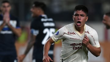 Universitario's midfielder Piero Quispe celebrates after scoring during the Copa Sudamericana group stage second leg football match between Peru's Universitario and Argentina's Gimnasia y Esgrima La Plata at the Monumental stadium in Lima on June 28, 2023. (Photo by CRIS BOURONCLE / AFP)