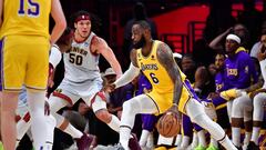 May 22, 2023; Los Angeles, California, USA; Los Angeles Lakers forward LeBron James (6) drives to the basket against Denver Nuggets forward Aaron Gordon (50) during the second quarter in game four of the Western Conference Finals for the 2023 NBA playoffs at Crypto.com Arena. Mandatory Credit: Gary A. Vasquez-USA TODAY Sports