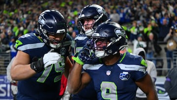 Jan 17, 2026; Seattle, WA, USA; Seattle Seahawks running back Kenneth Walker III (9) reacts with teammates after scoring a touchdown against the San Francisco 49ers during the second half in an NFC Divisional Round game at Lumen Field. Mandatory Credit: Steven Bisig-Imagn Images
