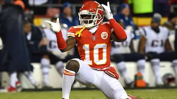 (FILES) In this file photo taken on January 20, 2019 Tyreek Hill #10 of the Kansas City Chiefs reacts after a catch in the second quarter against the New England Patriots during the AFC Championship Game at Arrowhead Stadium in Kansas City, Missouri. - Kansas City Chiefs star Tyreek Hill will not face criminal charges over an alleged attack on his infant son even though investigators are certain a crime took place, local prosecutors said Wednesday April 24, 2019. (Photo by Peter Aiken / GETTY IMAGES NORTH AMERICA / AFP)