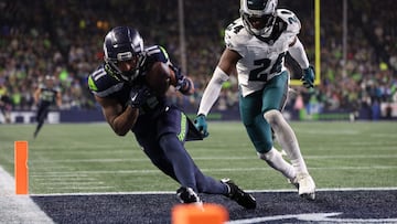 SEATTLE, WASHINGTON - DECEMBER 18: Jaxon Smith-Njigba #11 of the Seattle Seahawks catches a pass for a touchdown passed James Bradberry #24 of the Philadelphia Eagles in the fourth quarter at Lumen Field on December 18, 2023 in Seattle, Washington.   Steph Chambers/Getty Images/AFP (Photo by Steph Chambers / GETTY IMAGES NORTH AMERICA / Getty Images via AFP)