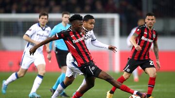 Soccer Football - Europa League - Round of 16 Second Leg - Bayer Leverkusen v Atalanta - BayArena, Leverkusen, Germany - March 17, 2022 Bayer Leverkusen's Edmond Tapsoba in action with Atalanta's Luis Muriel REUTERS/Thilo Schmuelgen